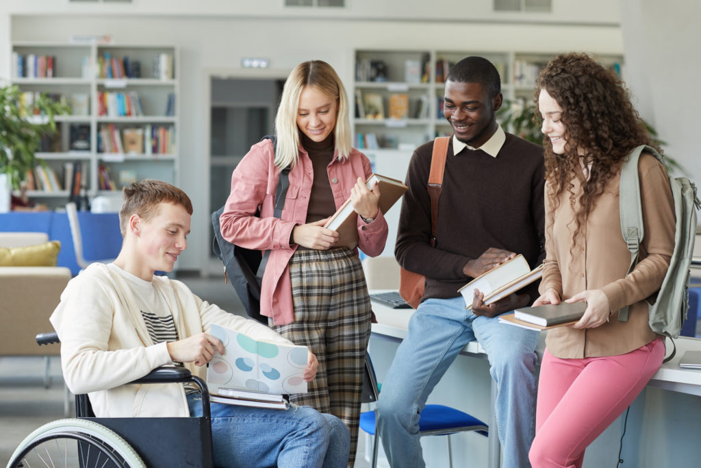 A group of college students in a classroom.