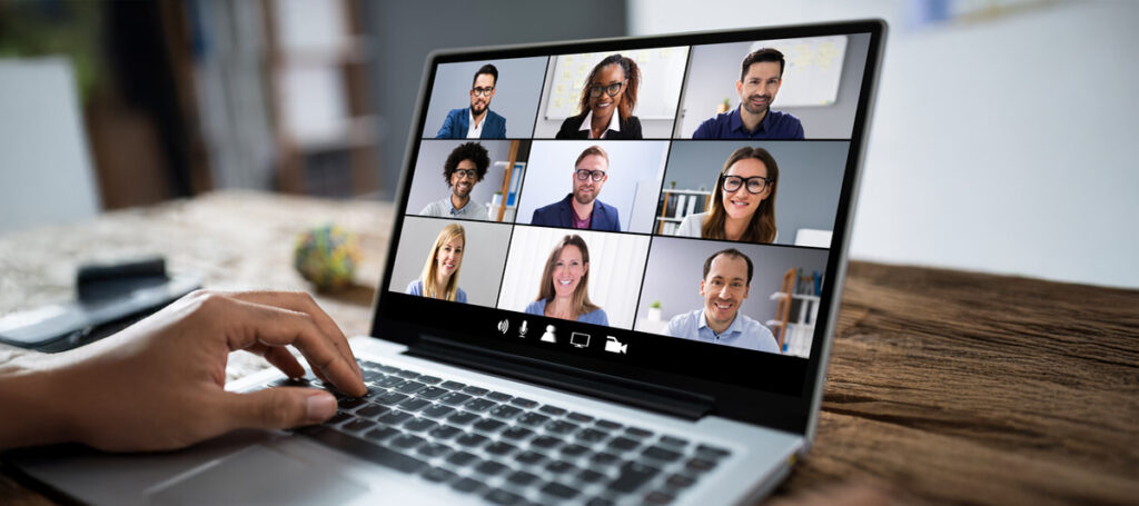 A view of a laptop screen showing a group of participants on a video call